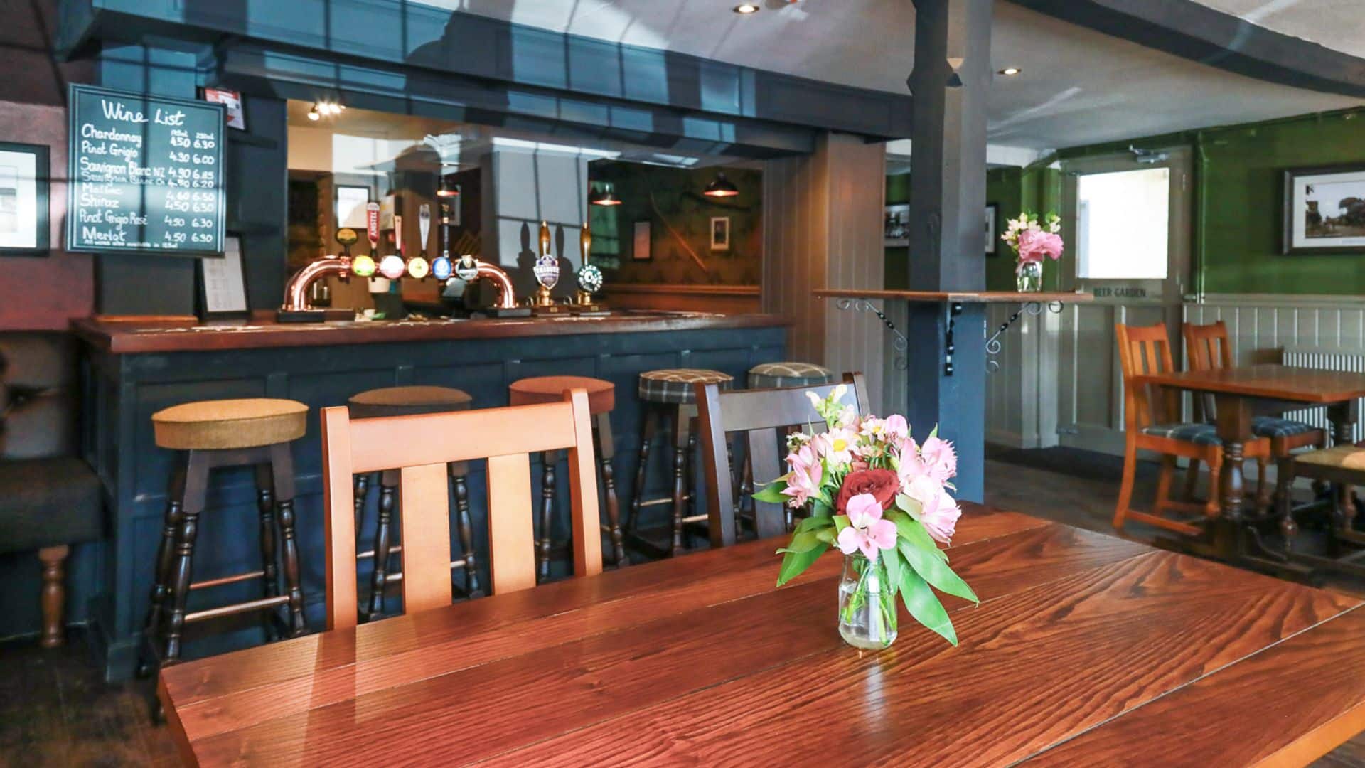 Table with a view of the bar