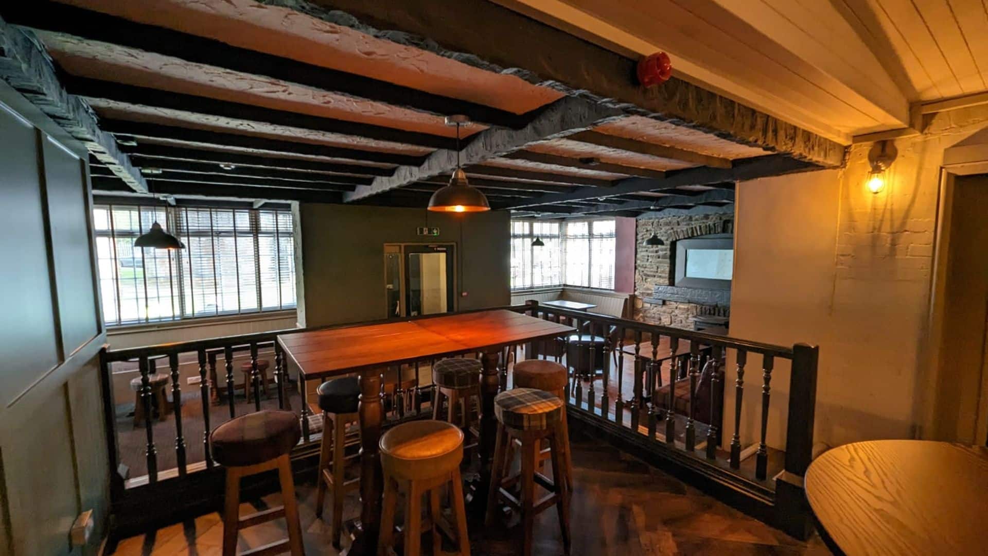 Table and stools inside the The Star Inn